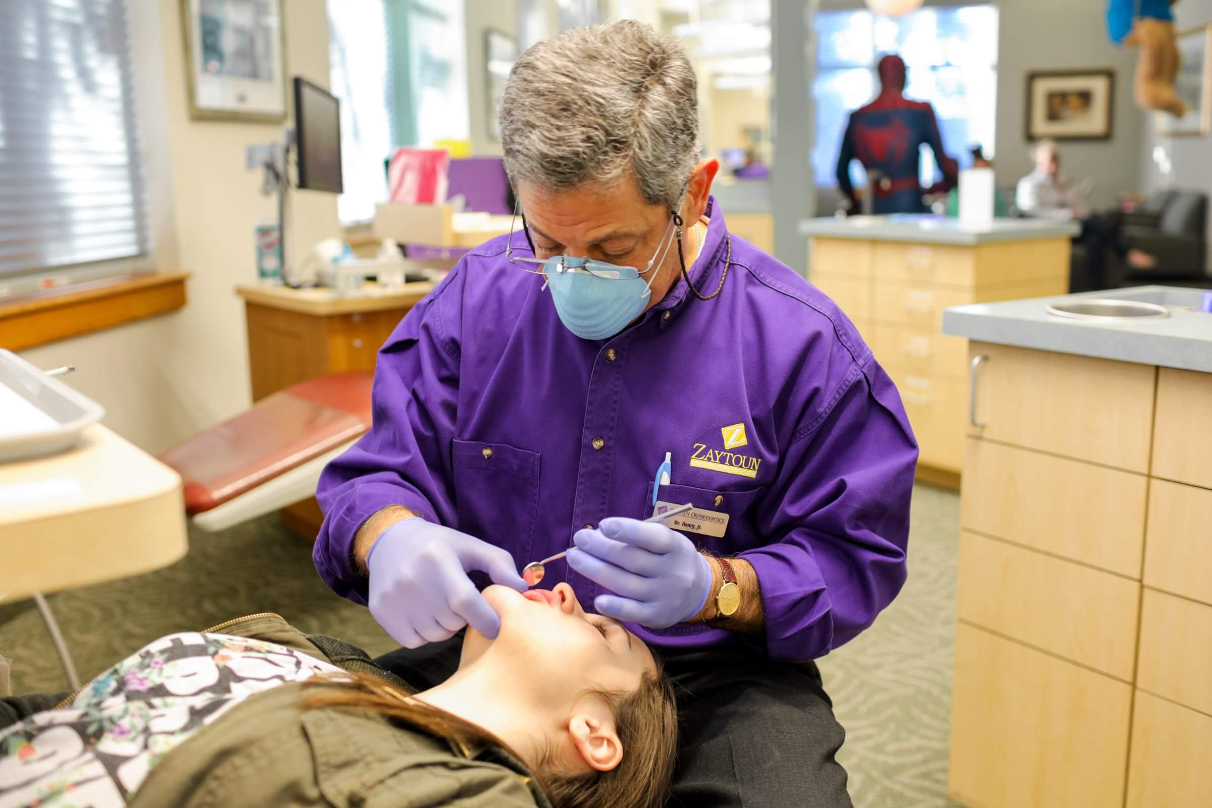 Doctor working on patient